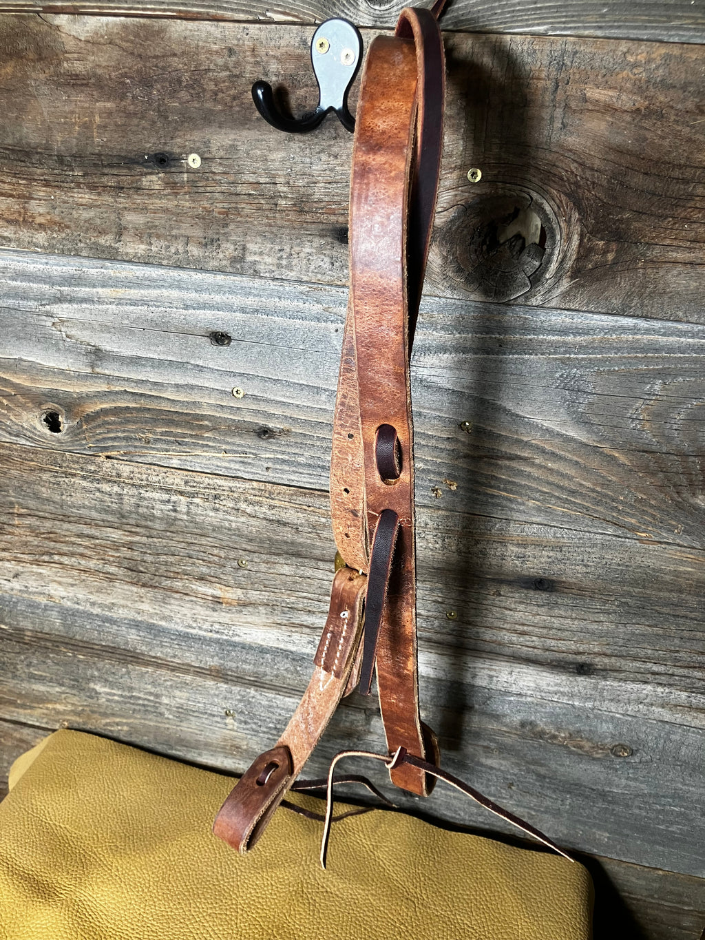 Harness latigo ear