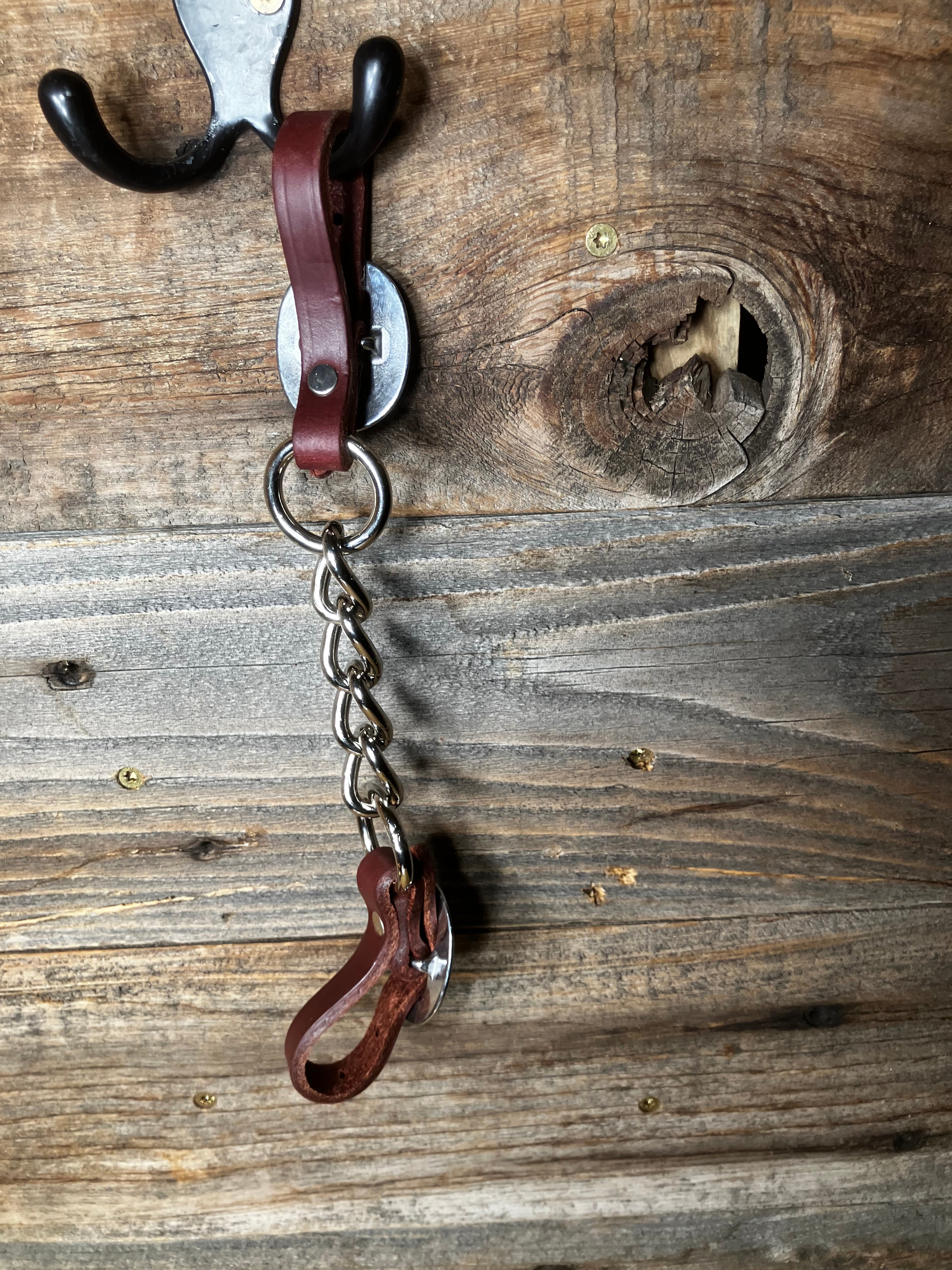 Latigo metal chain link