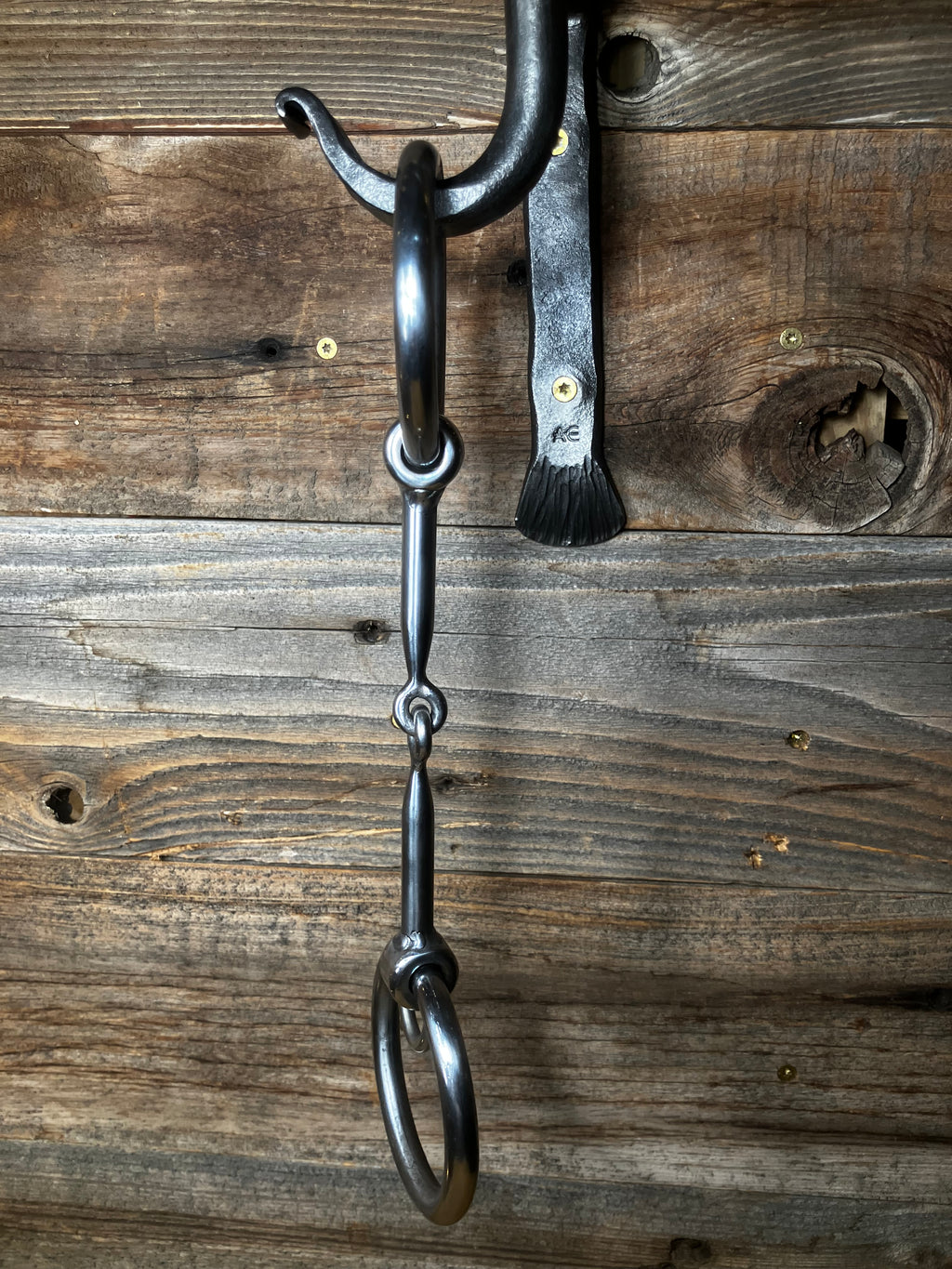 Locked ring straight smooth snaffle
