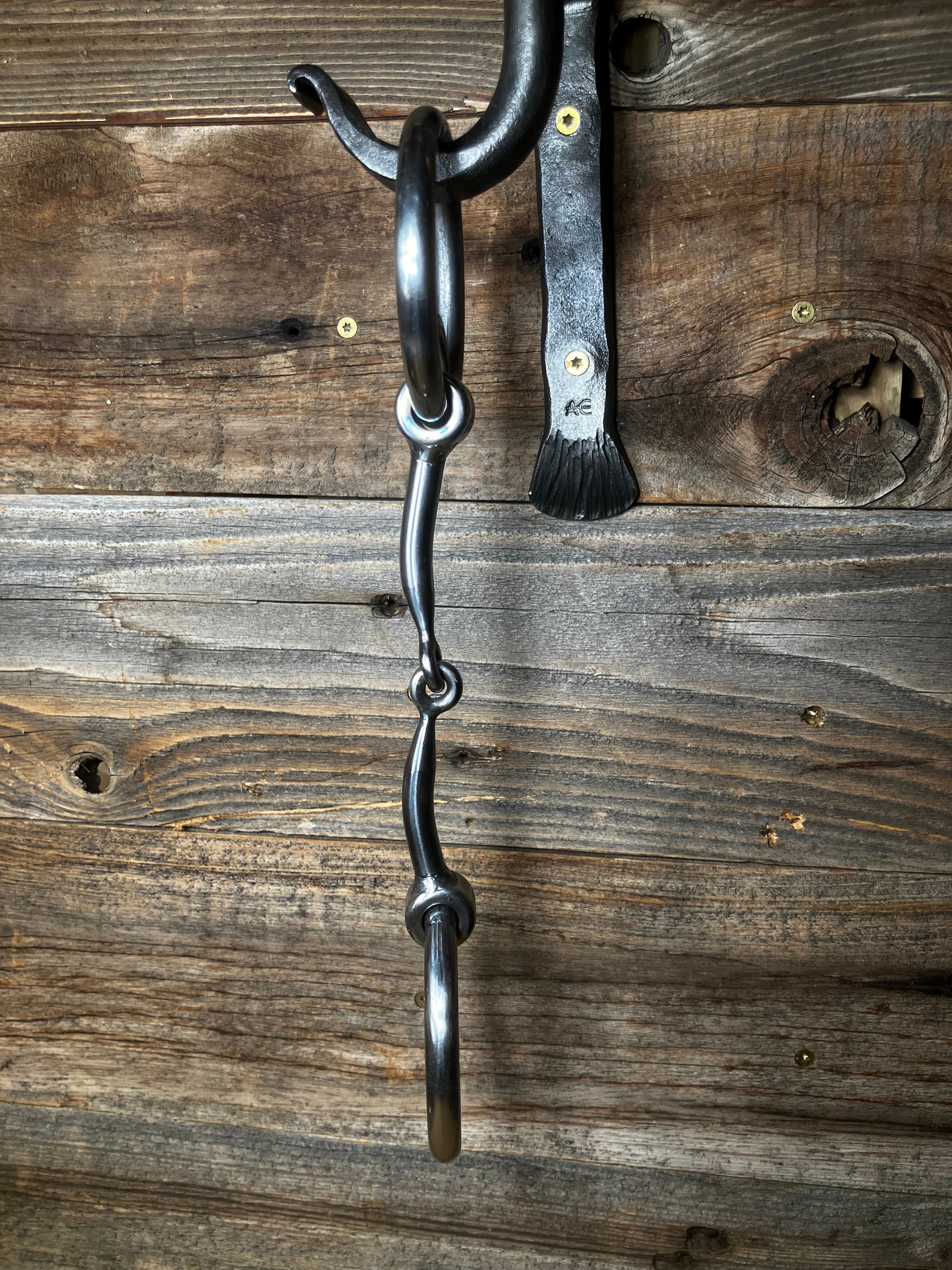 Locked ring curved smooth snaffle