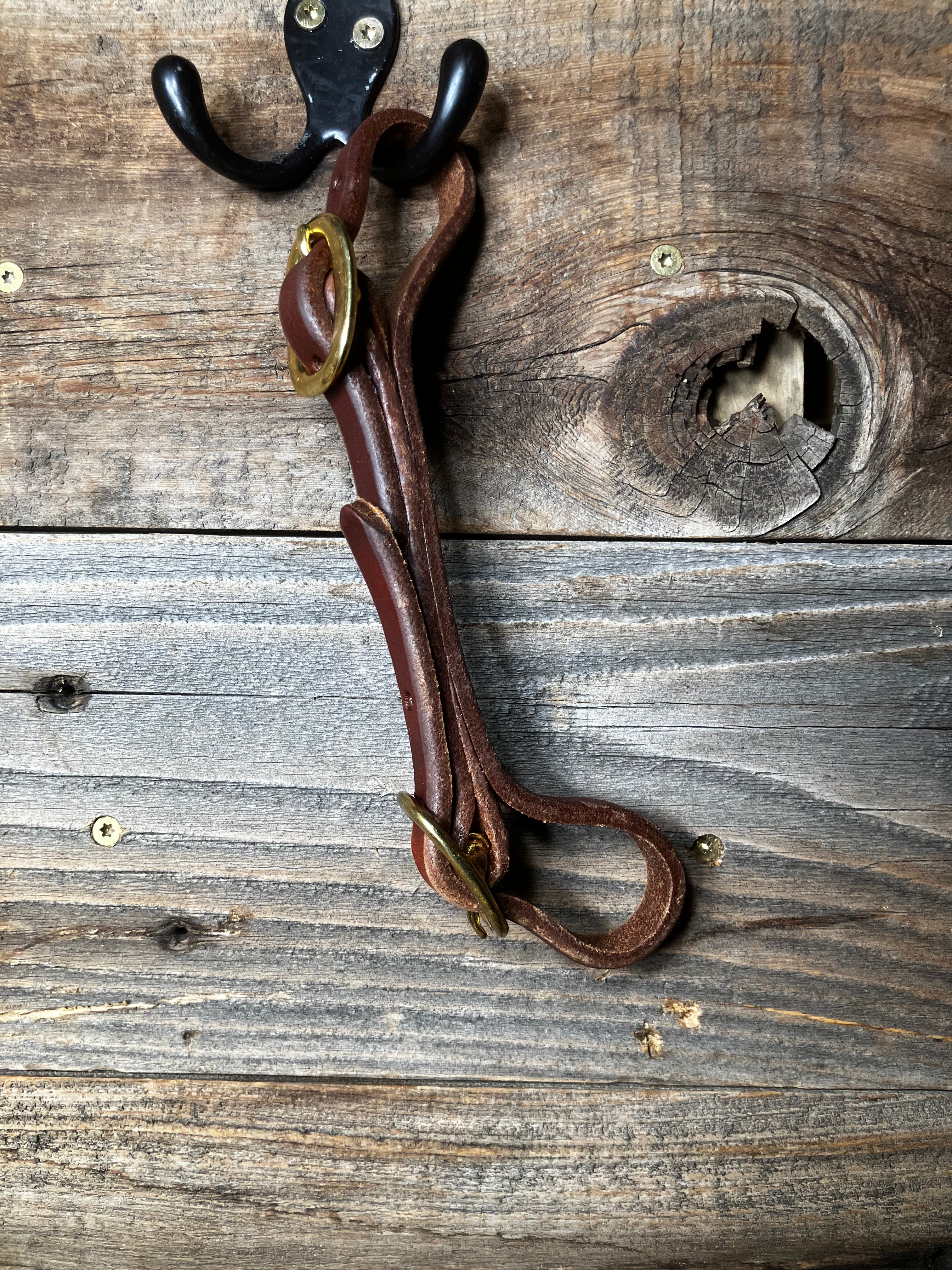 Brass heavy oil curb strap