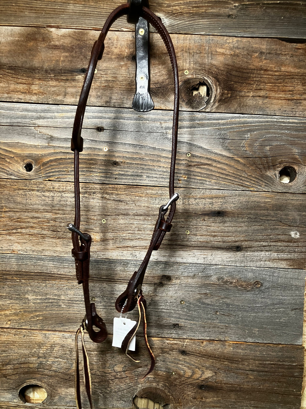 Roller buckle stitched single ear